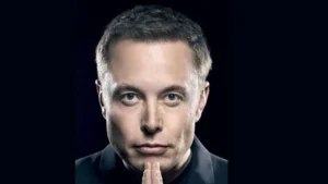 foto do rosto do bilionário e empreendedor ELON MUSK com camisa preta e fundo preto, capa do livro biográfico.